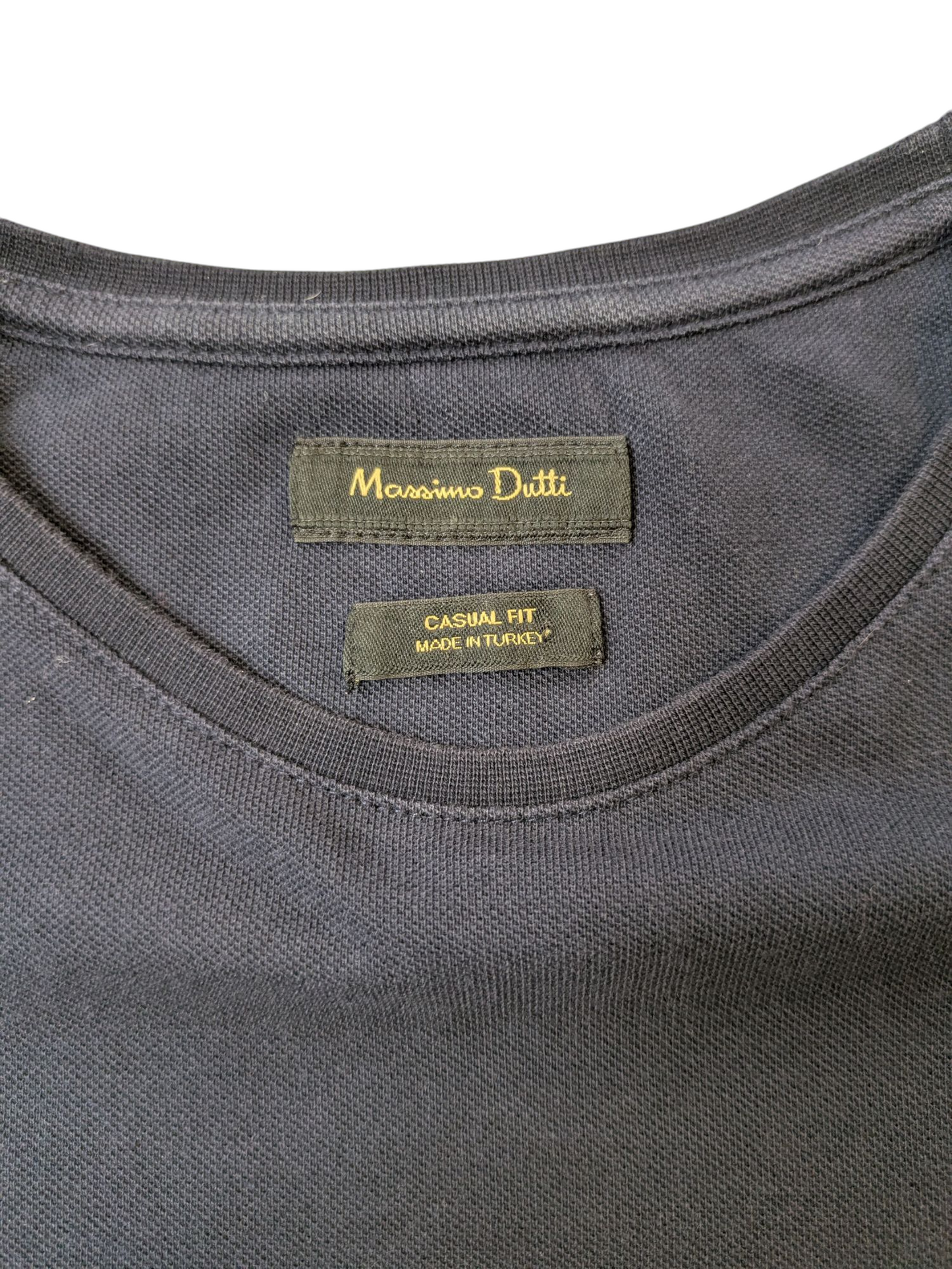 Camiseta de Massimo Dutton